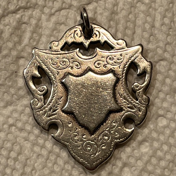 Jewelry - Antique silver Irish feis fob-medal. Shield in the middle of the fob.